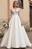 Load image into Gallery viewer, Ivory Satin A Line V Neck Sweep Train Wedding Dress with Lace