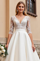 Load image into Gallery viewer, Ivory Satin A Line V Neck Sweep Train Wedding Dress with Lace
