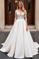 Load image into Gallery viewer, Ivory A Line Satin V Neck Sweep Train Wedding Dress with Lace