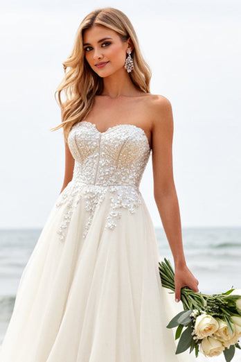 Ivory Organza Sweep Train Strapless Ball Gown Wedding Dress with Appliques