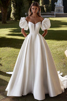 Load image into Gallery viewer, Ivory A Line Sweep Train Long Satin Wedding Dress with Puff Sleeves