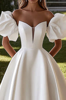 Load image into Gallery viewer, Ivory A Line Sweep Train Long Satin Wedding Dress with Puff Sleeves