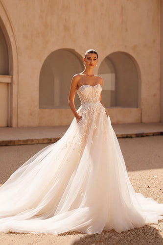 Ivory Strapless A Line Sweep Train Wedding Dress with Pockets