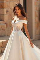 Load image into Gallery viewer, Ivory Off the Shoulder Satin A Line Sweep Train Wedding Dress with Lace