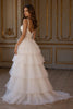 Load image into Gallery viewer, Ivory Tulle A Line Ruffled Tiered Sweep Train Wedding Dress with Slit