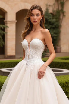 Ivory Ball Gown Sweetheart Tulle Sweep Train Wedding Dress