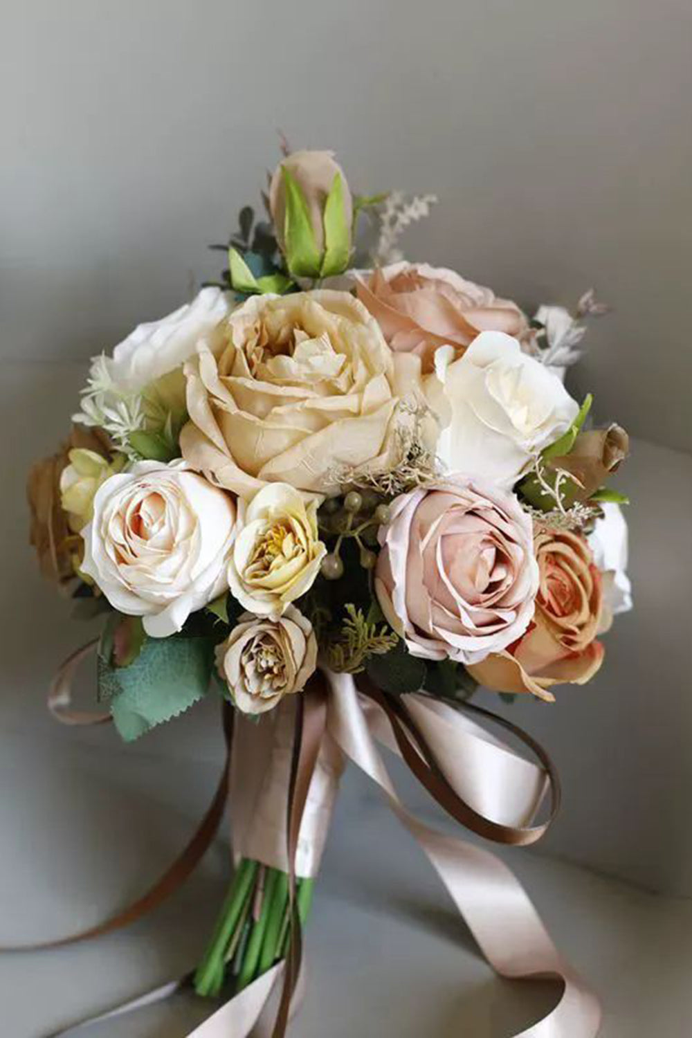 Hand Holding Champagne Flower Bridal Bouquet