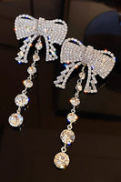 Load image into Gallery viewer, Silver Bow Sparkly Prom Drop Earrings with Rhinestones