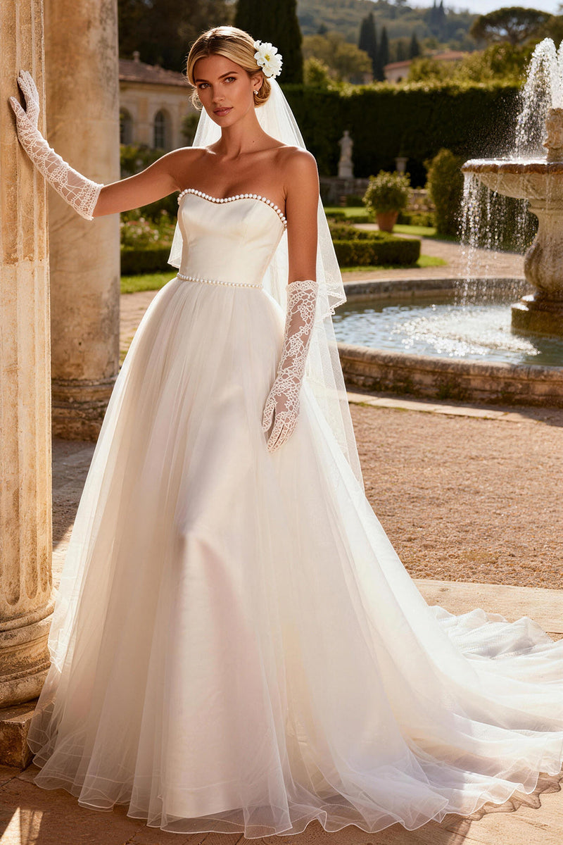Load image into Gallery viewer, Ivory Tulle Strapless A Line Sweep Train Beaded Wedding Dress