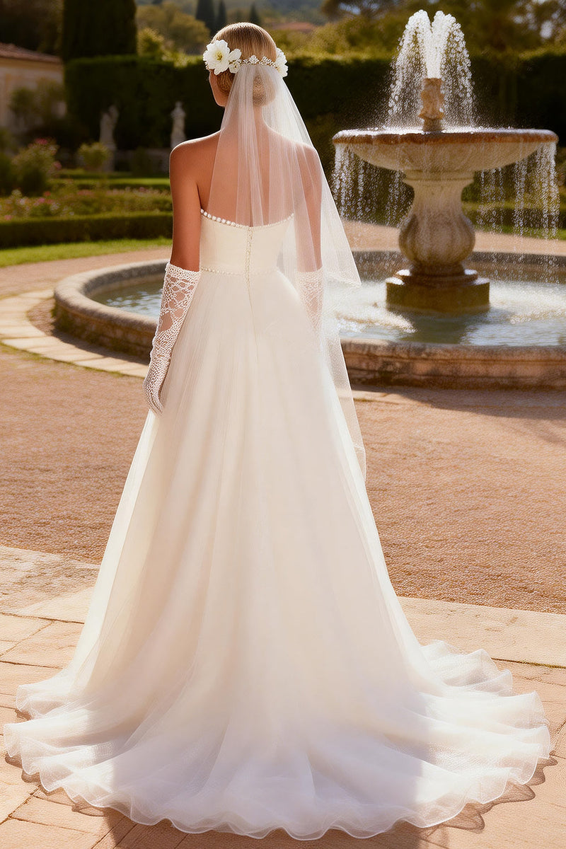 Load image into Gallery viewer, Ivory Tulle Strapless A Line Sweep Train Beaded Wedding Dress