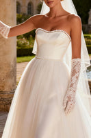 Load image into Gallery viewer, Ivory Tulle Strapless A Line Sweep Train Beaded Wedding Dress