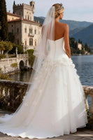 Load image into Gallery viewer, White Tulle Strapless Corset Sweep Train A Line Wedding Dress with 3D Flowers