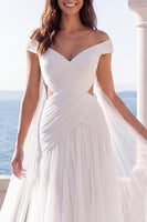 Load image into Gallery viewer, Cut Out Off the Shoulder Ivory A Line Beach Sweep Train Wedding Dress with Cape