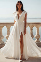 Load image into Gallery viewer, Ivory Ruffled V-Neck Ruched A Line Sweep Train Beach Wedding Dress with Slit